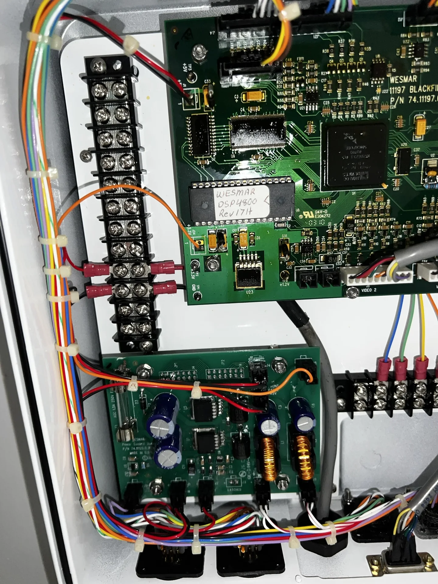 Wesmar marine electronic control board with terminal strip and connected wiring.