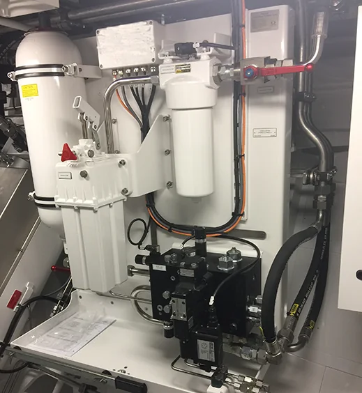 Marine hydraulic control panel with reservoir, filter, accumulator, valves, and connected components