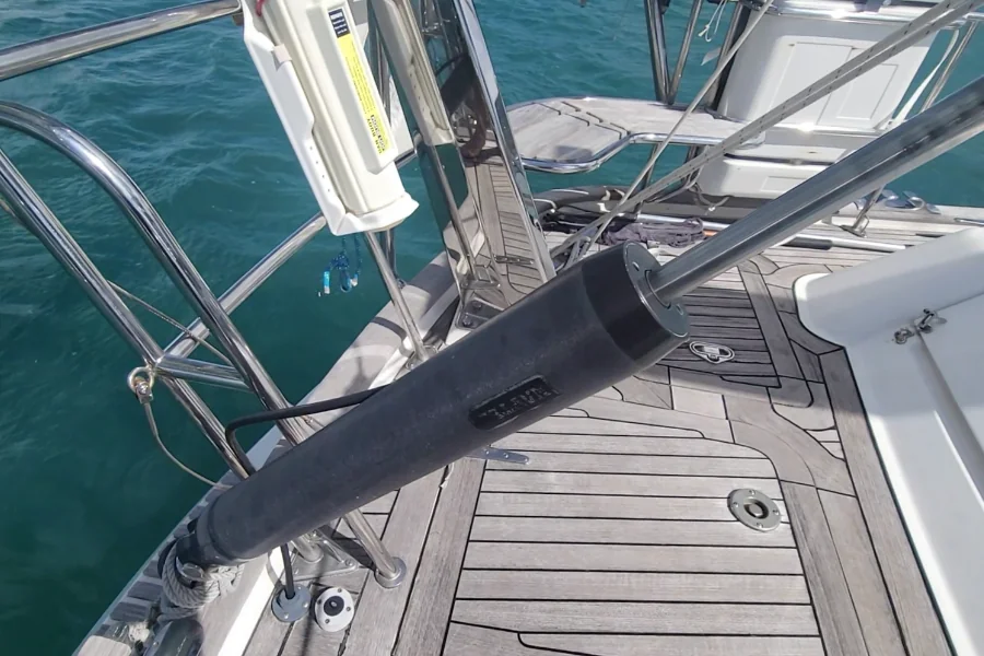 Hydraulic rigging cylinder and stern attachment installed on a sailboat deck