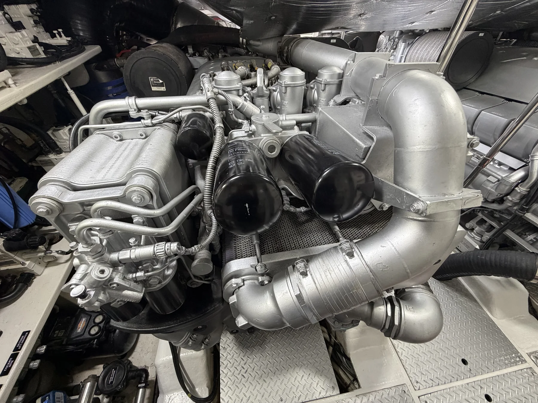MTU diesel engine and service components in a Pershing engine room.