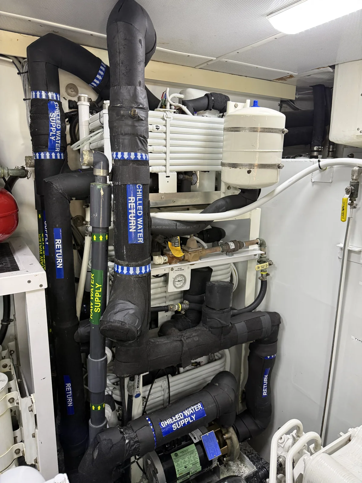 Marine chilled-water system with labeled insulated supply and return piping.